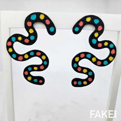 Pendientes iter meandro confetti negro y amarillo