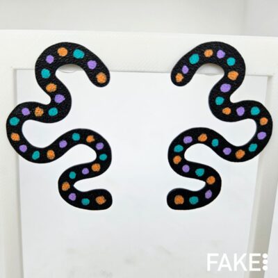 Pendientes iter meandro confetti negro y naranja